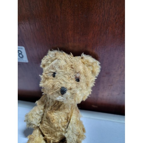 138 - Rare vintage miniature mohair teddy bear filled with sawdust, with black glass eyes movable legs and... 