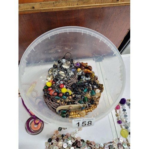 158 - Large tub containing a large quantity of costume jewellery mostly beaded necklaces all in good order