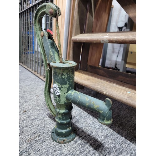 382 - Cast iron water pump 50cm high painted in green in good antique condition