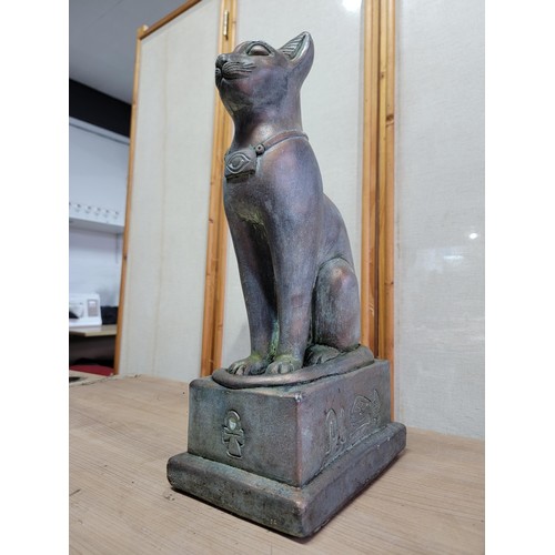 383 - Good quality stoneware Egyptian cat on a plinth with bronze effect, hieroglyphics to the sides. The ... 