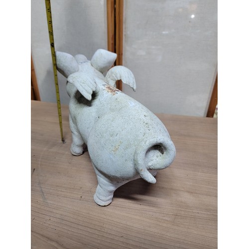 386 - Good quality white cast iron flying pig money box ornament of large proportions measures 30cm high 4... 