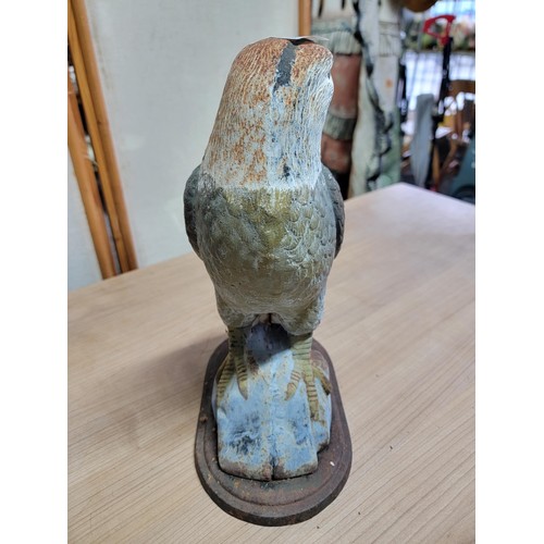 388 - Good quality cast iron figure of a Sea Eagle well detailed standing on a cast iron plinth in overall... 