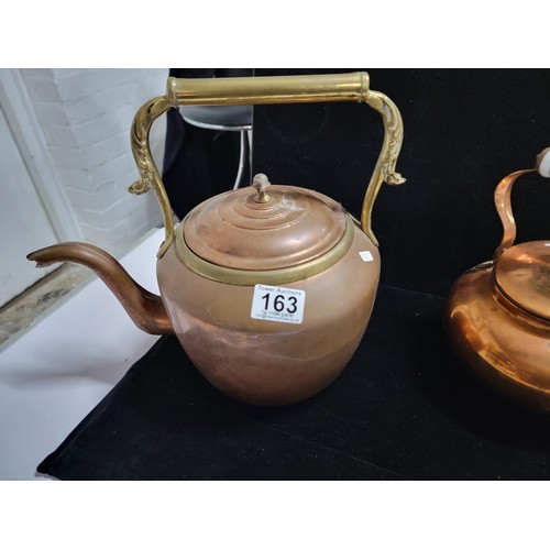 163 - 2x vintage copper items inc a large brass and copper kettle with sroll work to the handle along with... 