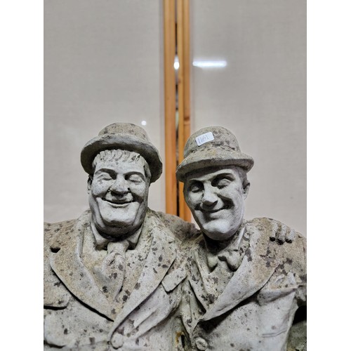 392 - Good quality very heavy garden concrete figure of Laurel and Hardy in good order, shows signs of wea... 