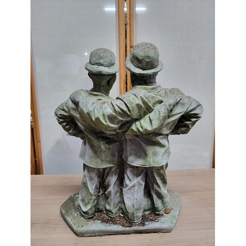 392 - Good quality very heavy garden concrete figure of Laurel and Hardy in good order, shows signs of wea... 