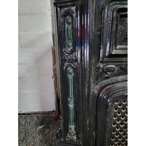 395 - Good quality French antique late Victorian cast iron enamel stove in black with green coloured decor... 