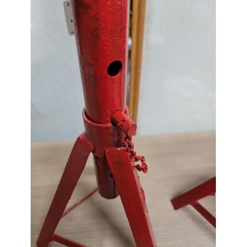 404 - Pair of red heavy duty axle stands complete with locking pins