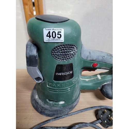 405 - Box containing a quantity of tools inc a large heavy duty Parkside sander, Atlas circular saw along ... 