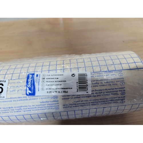 406 - 2x rolls containing a large quantity of plastic adhesive film one is sealed and unused