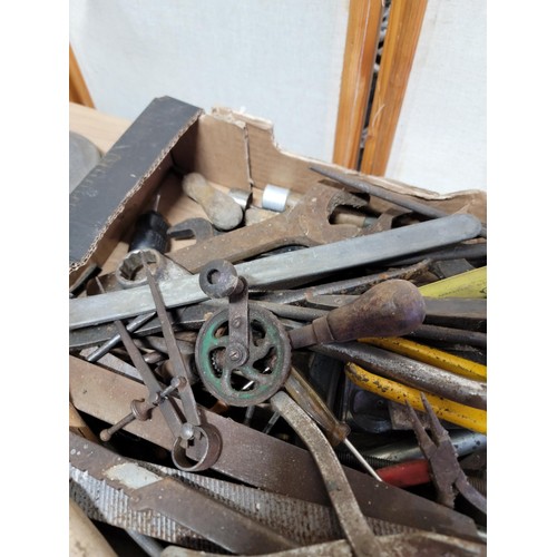 408 - Box containing a large quantity of tools inc hand saws, spanners, files, hand drills, spirit level, ... 