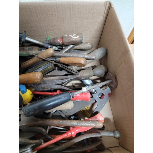 409 - 2x boxes containing a large quantity of tools inc a quantity of large circular saw blades, hand saws... 