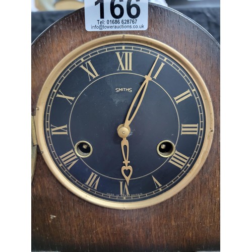 166 - Smiths Enfield black faced mantel clock chiming on a coiled gong complete with pendulum and key