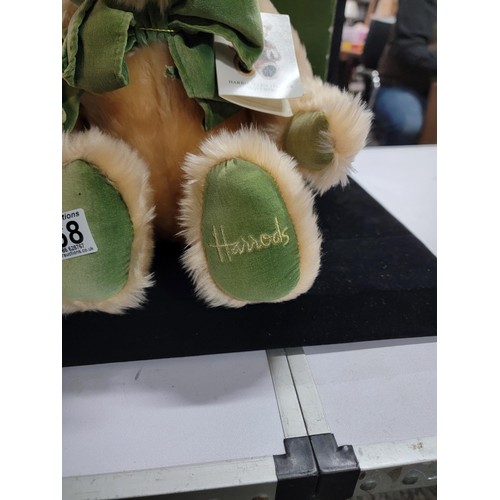 168 - Boxed 1995 Harrods Teddy Bear, in good order with green velvet dickie bow and Harrods logo sewn into... 