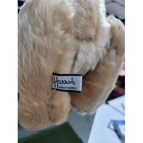 168 - Boxed 1995 Harrods Teddy Bear, in good order with green velvet dickie bow and Harrods logo sewn into... 