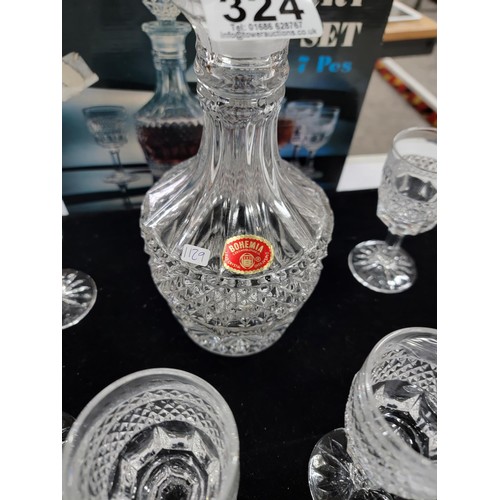 324 - Boxed Bohemia lead crystal 7 piece sherry set in good order, inc 6x sherry glasses and a decanter co... 