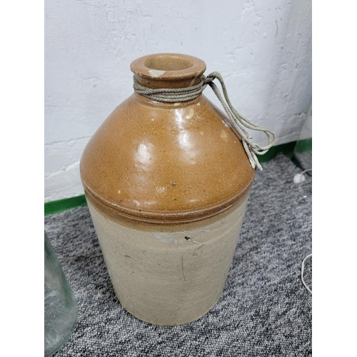 331 - Quantity of collectables inc 2x gallon whiskey bottles, a large earthen ware flagon with chip to the... 