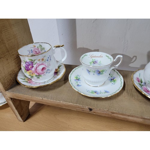 332 - Royal Imperial harlequin style part teaset inc 5x trios, cake plate, cup & saucer, sugar bowl and mi... 