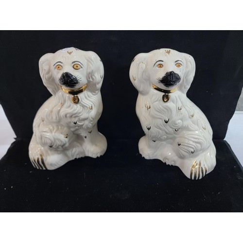 339 - Quantity of 7x graduated ceramic white spaniels inc 2x Royal Doulton, 4x Beswick and a Avalon piece,... 