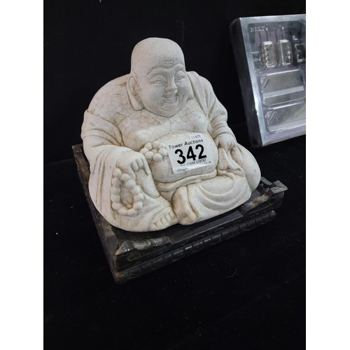 342 - Small white stoneware Buddha sitting on a wooden deck along with a boxed luggage tag set inc 2x padl... 