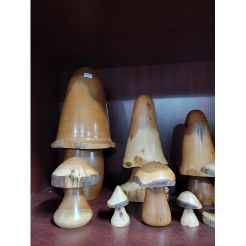 343 - Collection of 22x wooden formed toadstools of various sizes inc 5 graduate toadstools largest stands... 