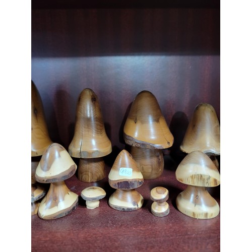 343 - Collection of 22x wooden formed toadstools of various sizes inc 5 graduate toadstools largest stands... 