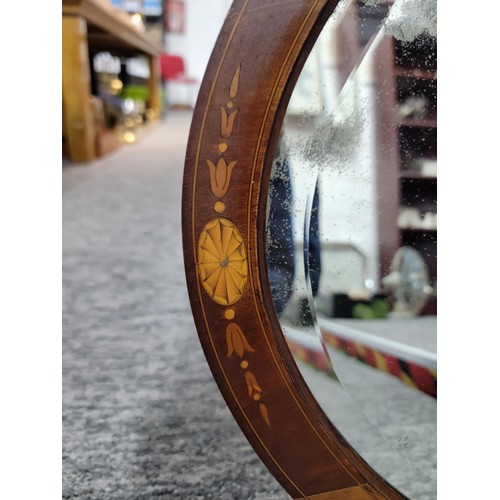 344 - Vintage mahogany oval bevel edged mirror with string inlay around the edge and Sherton style inlay d... 