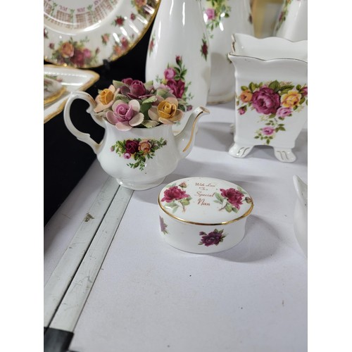 355 - Collection of Royal Albert Old Country Roses inc plates vases jugs, candle stick holders, shoes, clo... 