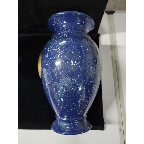 359 - Pair of blue glaze vases both with the a symbol of the moon and the sun respectively , one has nibbl... 