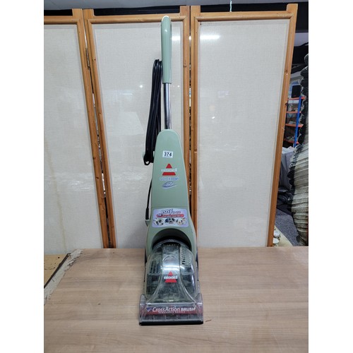 374 - Bissell carpet cleaner in good working order complete with removable reservoir