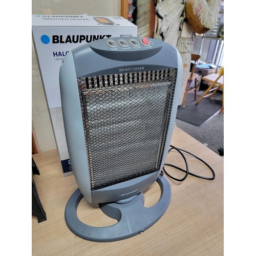 375 - Boxed blaupunkt halogen heater along with a log burner style electric heater with light up back plat... 