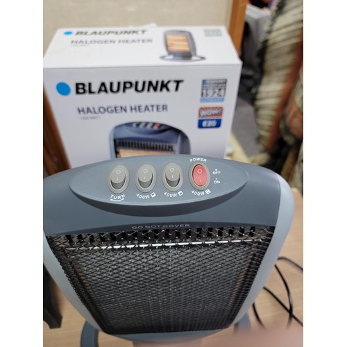 375 - Boxed blaupunkt halogen heater along with a log burner style electric heater with light up back plat... 