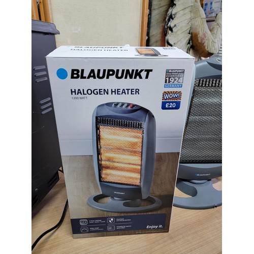 375 - Boxed blaupunkt halogen heater along with a log burner style electric heater with light up back plat... 