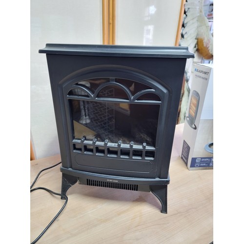 375 - Boxed blaupunkt halogen heater along with a log burner style electric heater with light up back plat... 