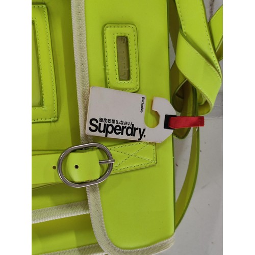 453 - A brand new bright neon yellow Superdry satchel unused with tags. RRP £44.99 from Superdry