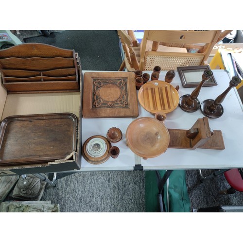 460 - Box of wooden items inc bowls barometer candle sticks, quantity of burr walnut egg cups, art nouveau... 