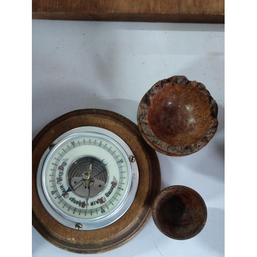 460 - Box of wooden items inc bowls barometer candle sticks, quantity of burr walnut egg cups, art nouveau... 