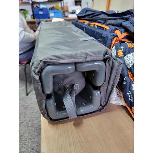 440 - 2 x Travel cots and a folding camping table all in their carry bags