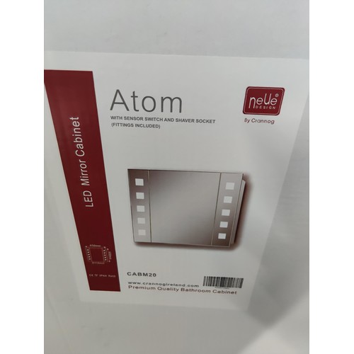 471 - Boxed as new integral Atom LED mirror complete with sensor switch and shaver socket fittings include... 