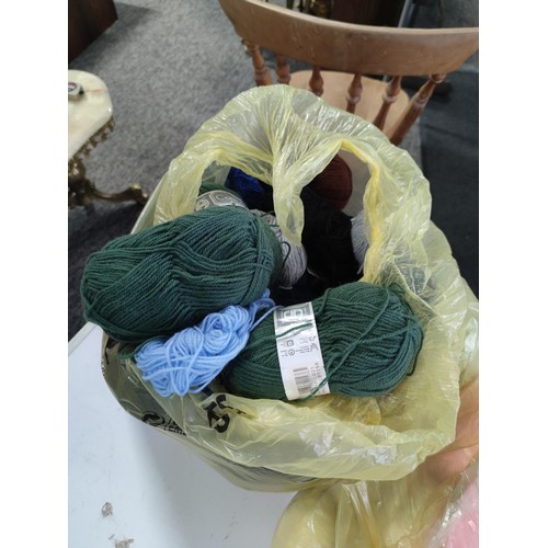 487 - 3x bags conatining a large quantity of knitting wool full, of many colours inc blue, cream, pink,