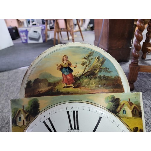 499 - Longcase clock hand painted with great turned pillars with brass caps c19 century with country scene... 