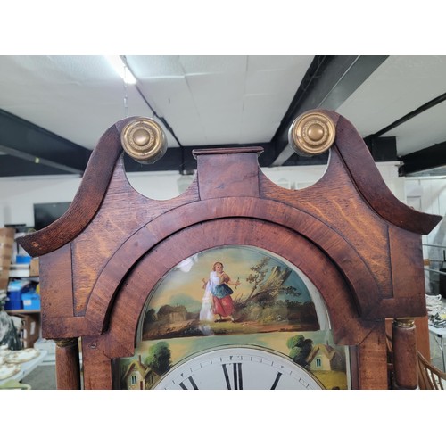 499 - Longcase clock hand painted with great turned pillars with brass caps c19 century with country scene... 