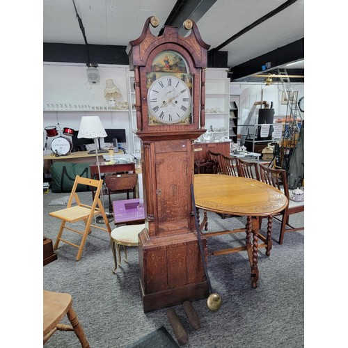 499 - Longcase clock hand painted with great turned pillars with brass caps c19 century with country scene... 