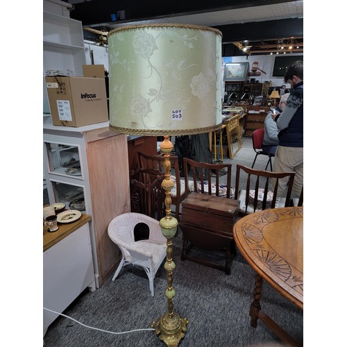 503 - Impressive Onyx featured standard lamp with brass sections with a light green shade