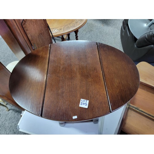 505 - Oak drop sides grog side lamp table along with a writing slope in need of restoration, grog table me... 