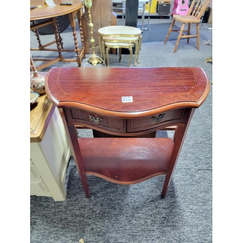 510 - Reproduction Half moon serpentine hall table with two drawers to the front in mahogany, measures 76c... 