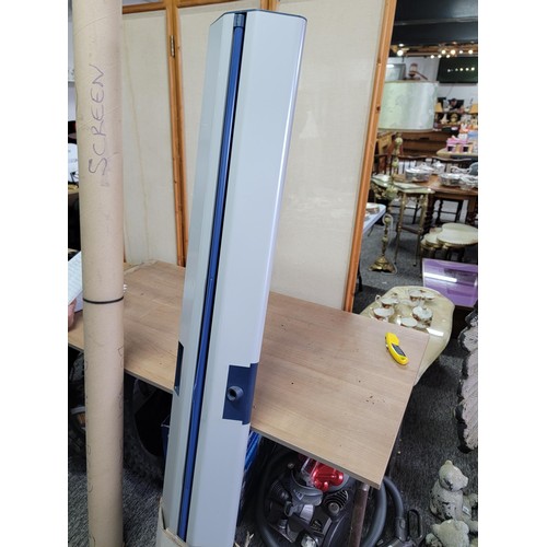 449A - Large roll up movie/projector screen of good quality and hardly used along with a further screen in ... 