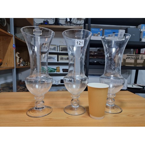 121 - A set of 3 tall clear glass vases by Peony England, all in good clean condition. Each have a height ... 