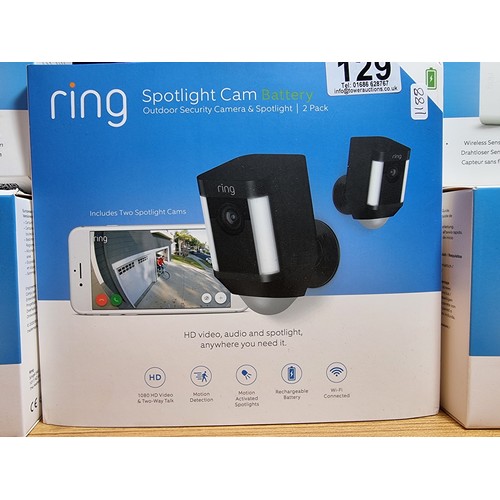 129 - A comprehensive ring security lot to include an as new Ring spotlight cam battery, two pack of batte... 