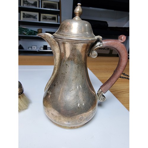 264 - Hallmarked silver lidded small coffee pot along with an hallmarked silver grooming brush. Jug hallma... 