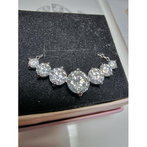 272 - Stunning brand new 925 silver necklace inset with seven Moissanite diamond stones featuring a large ... 